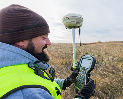 NextEra Energy Resources employee siting a wind farm